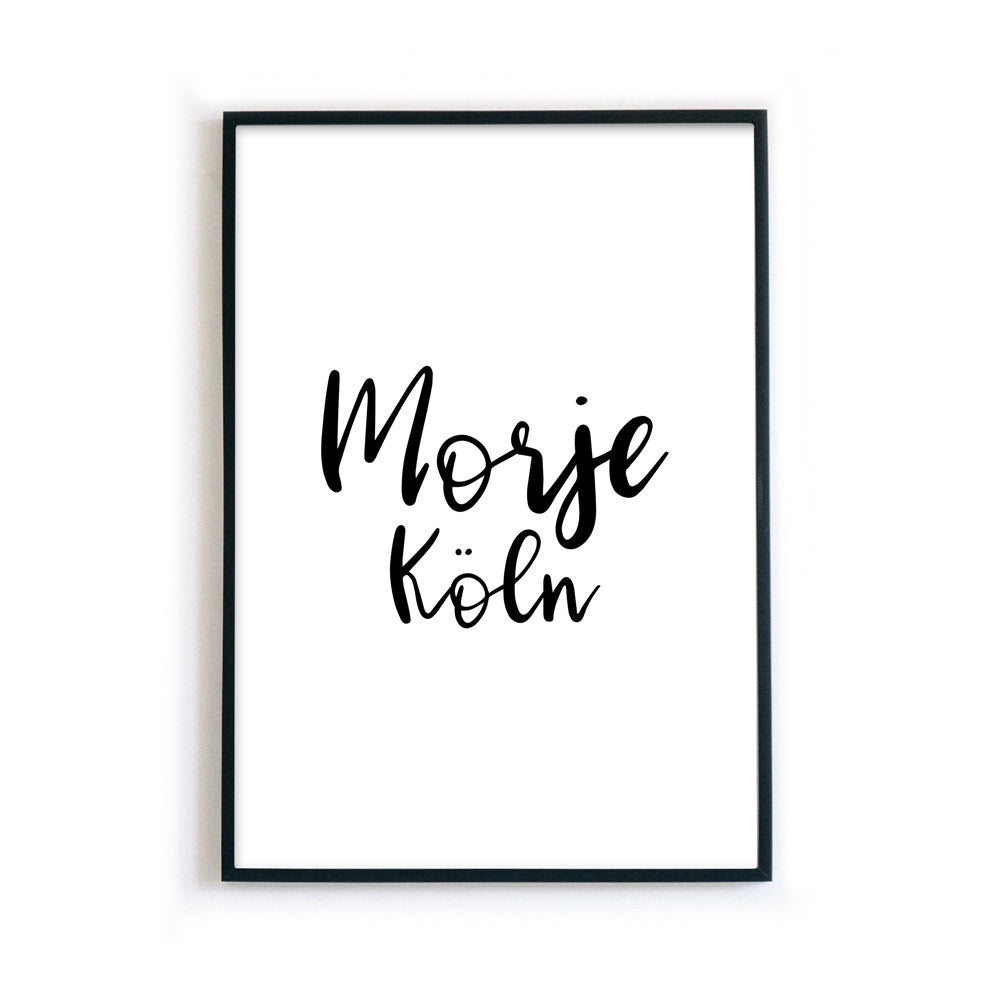 Morje Köln Poster. Spruch Bild mit schwarzer verspielter Schrift fertig gerahmt im schwarzen Bilderrahmen