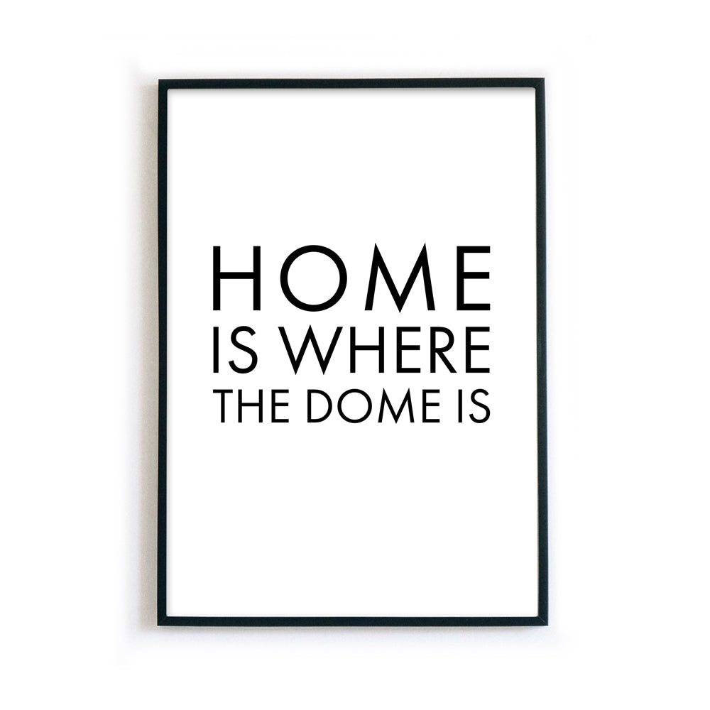 Home is where the dome is Poster. Köln Spruch Bild in schwarzer Schrift auf weißen Papier. Wandbild fertig gerahmt.