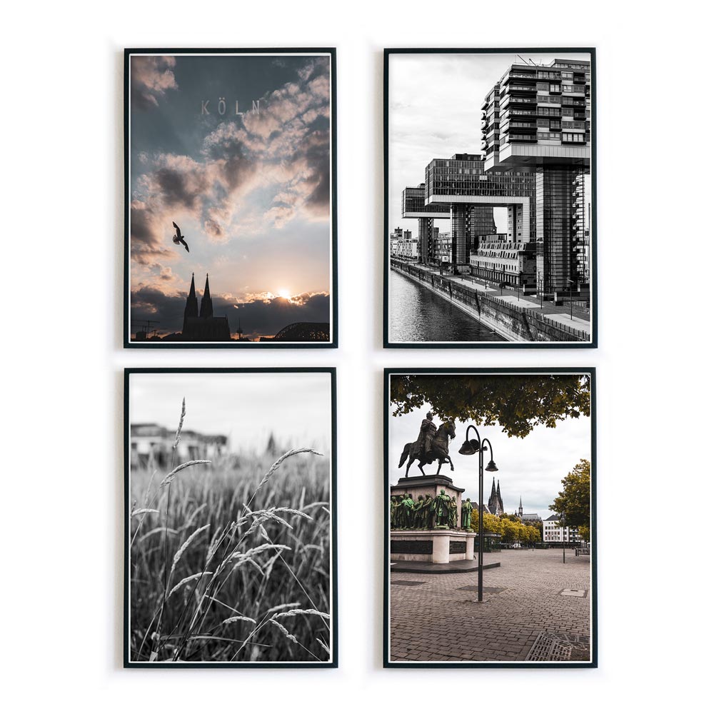 Vier Köln Poster in Bilderrahmen. Zwei in schwarz weiß, zwei in Farbe. Kölner Dom, Kranhäuser und Innenstadt von Köln Fotografien.